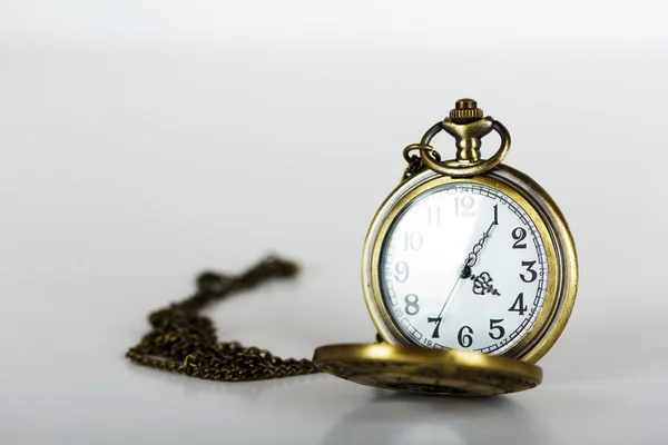 Pocket watch against a light background — Stock Photo, Image