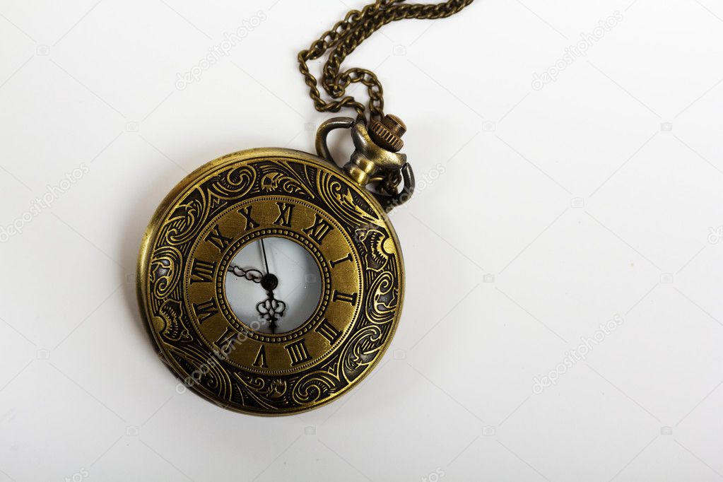 Pocket watch against a light background