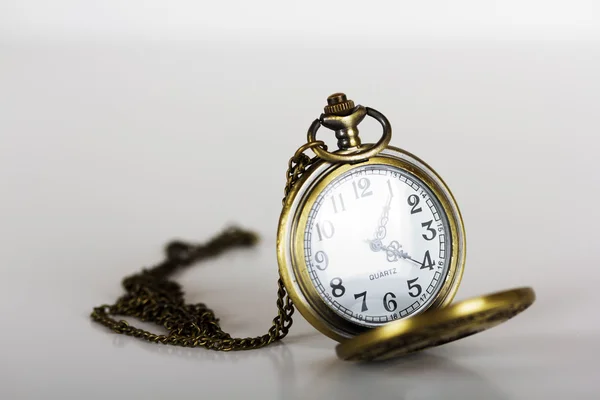 Pocket watch against a light background — Stock Photo, Image