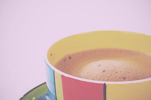 Hot chocolate in a bright colourful cup Vintage Retro Filter. — Stock Photo, Image