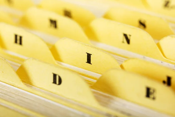 Close up of alphabetical index cards in box