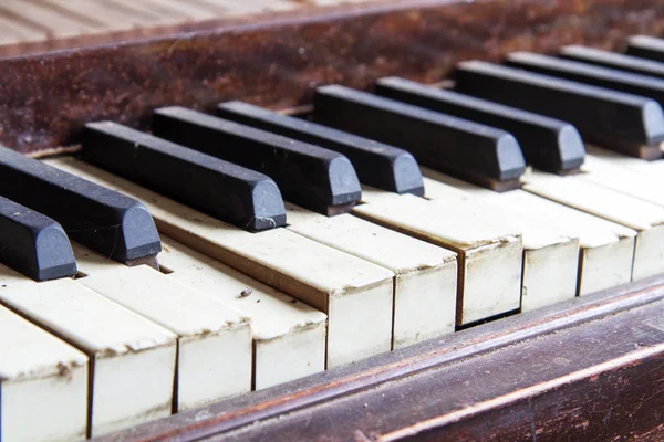 Keys from an old broken damaged piano