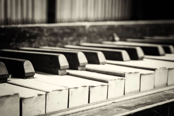 Keys from an old broken damaged piano