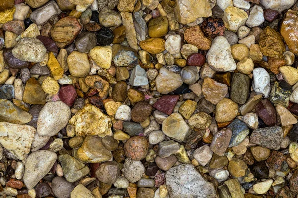 Fundo de pedras marinhas. Fechar a textura das pedras — Fotografia de Stock