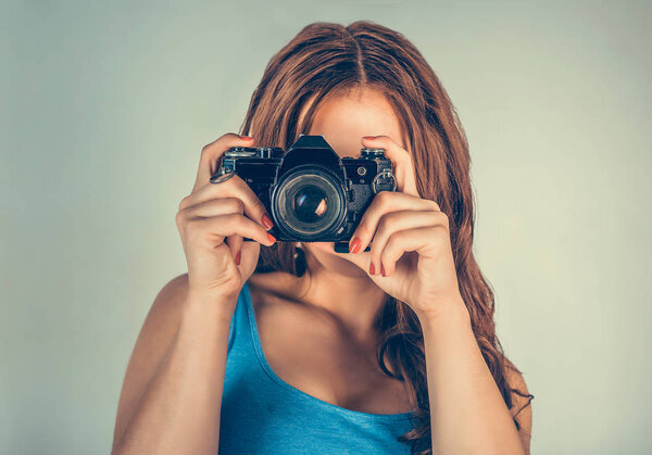 Photographer. Woman lady girl taking pictures