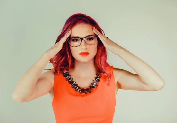 Stressed woman hands on head