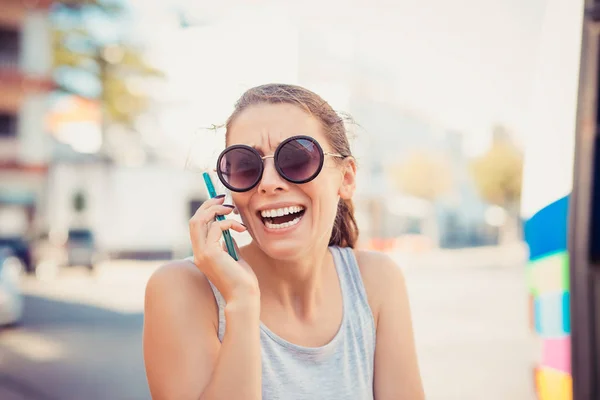 Portrait surprised laughing smiling screaming woman looking at phone — Stock Photo, Image