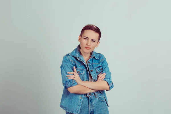 Doubtful success short hair woman casual jeans clothes isolated on green grey white background with copy space — Stock Photo, Image