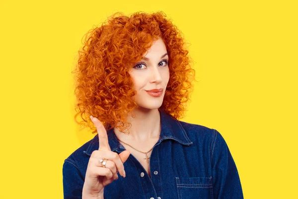 Woman gesturing a no sign. Closeup portrait unhappy, serious redhead curly hair girl raising finger up saying oh no you did not do that yellow background. Negative emotions facial expressions feelings — Stock Photo, Image