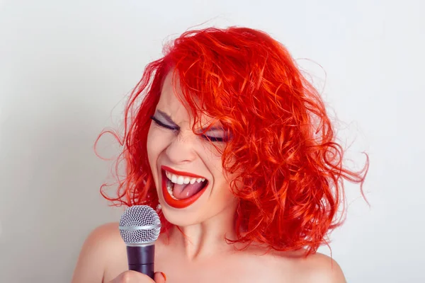 Woman with Microphone. Female funny singer screaming on mic — Stock Photo, Image