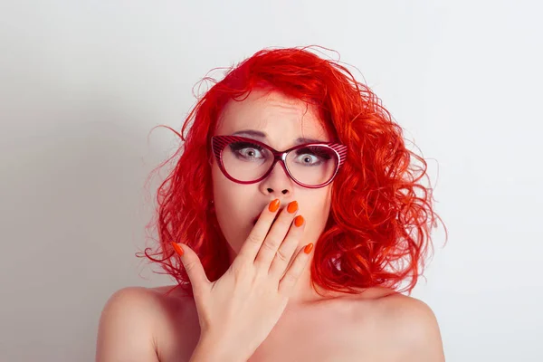 Beautiful shocked surprised woman girl with glasses, covering mouth with hand Stock Image