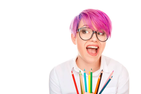 Divertido excitado joven mujer sosteniendo lápices de colores aislados blanco —  Fotos de Stock