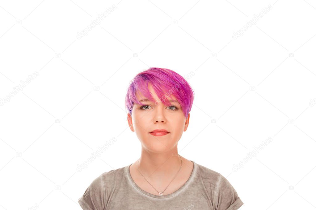 Serious attractive young female with magenta hair