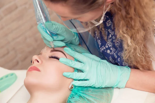 Micropigmentation eyebrows work flow in a beauty salon
