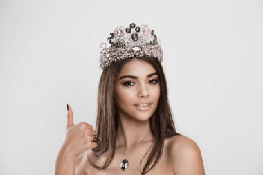 Indian like. Enthusiastic beauty queen woman giving thumbs up