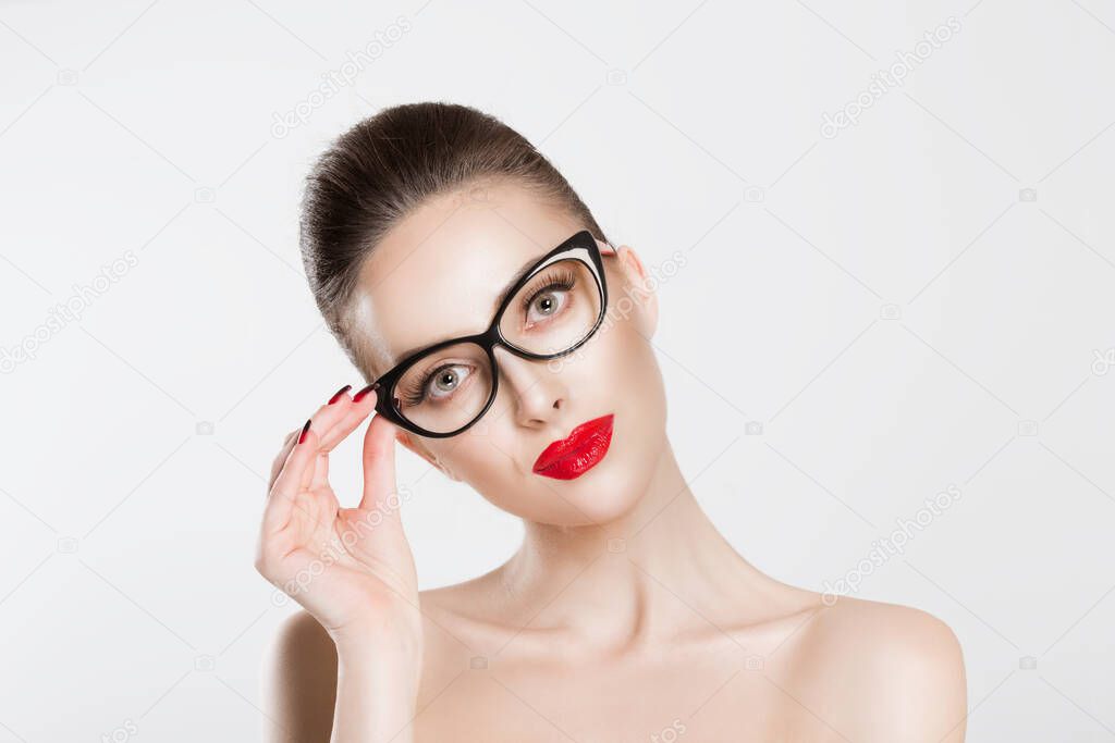 View, optic concept. Attractive woman with slight smile holding 