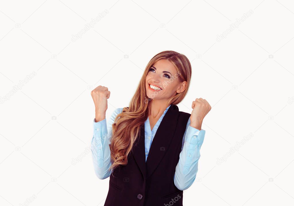 happy business woman exults pumping fists ecstatic celebrates success isolated on white