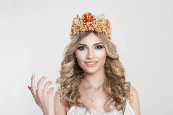 Come here. Beauty crowned queen girl woman actress miss bride asking you to come closer with hand gesture looking at camera isolated white background wall. Full makeup silver pink crystals crown