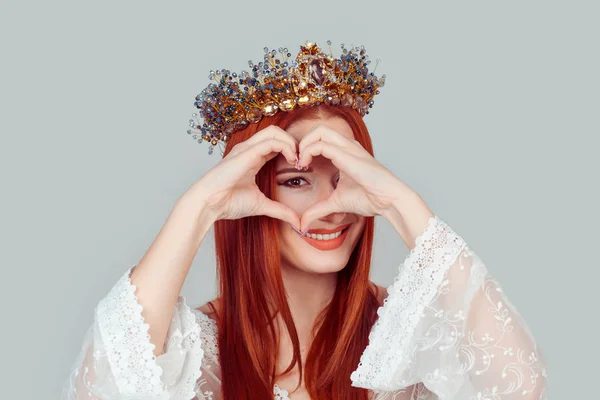 Beauty queen pageant showing love and care. Cheerful happy woman making heart sign with hands pretty woman with crystal crown on head isolated on light gray — 스톡 사진