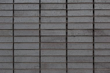 Beton blok duvar, dikişsiz arka plan ve doku gri tuğlalar, açık hava duvarı.