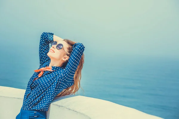 Travel to the sea, freedom enjoyment concept. Close up portrait beautiful happy free young woman fashion enjoying nature peace  fresh air daydreaming of great future isolated seascape ocean background