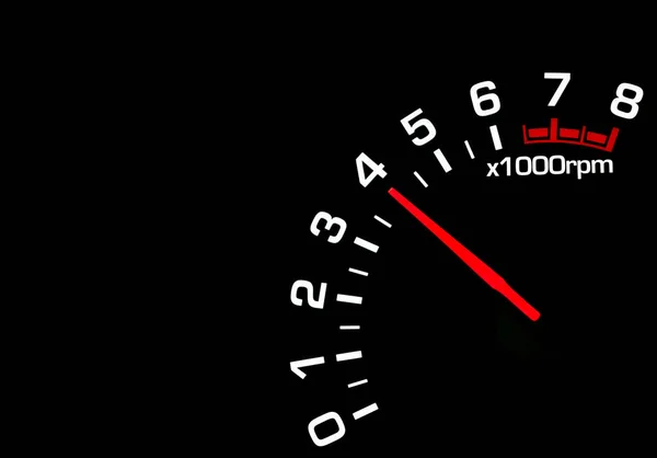 Close up shot of a car speedometer tachometer on black background — Stock Photo, Image