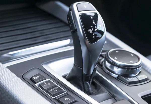 Automatic gear stick of a modern car, car interior details — Stock Photo, Image