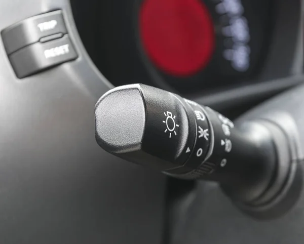 Car lighting control understeering switch, car interior details — Stock Photo, Image