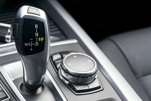 Automatic gear stick of a modern car, car interior details — Stock Photo, Image