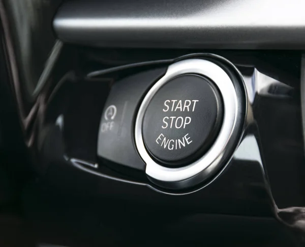 Car dashboard with focus on engine start stop button, car interi — Stock Photo, Image
