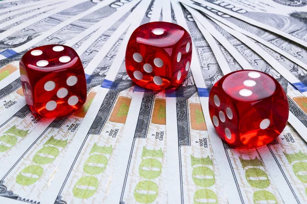 Poker dice rolls on a dollar bills, Money. Poker table at the casino. Poker game concept. Playing a game with dice. Casino dice rolls. Concept for business risk. chance good luck