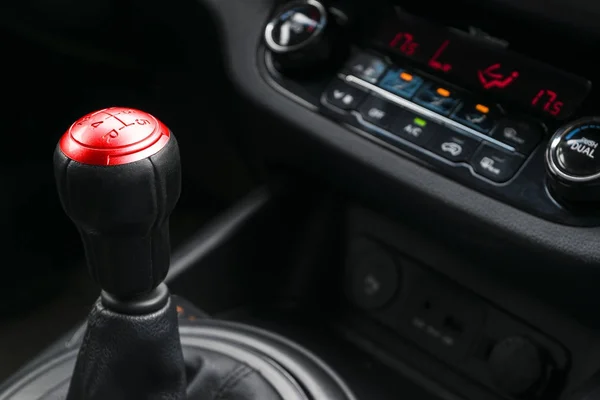 Close up view of a red gear lever, manual gearbox, car interior detail — Stock Photo, Image