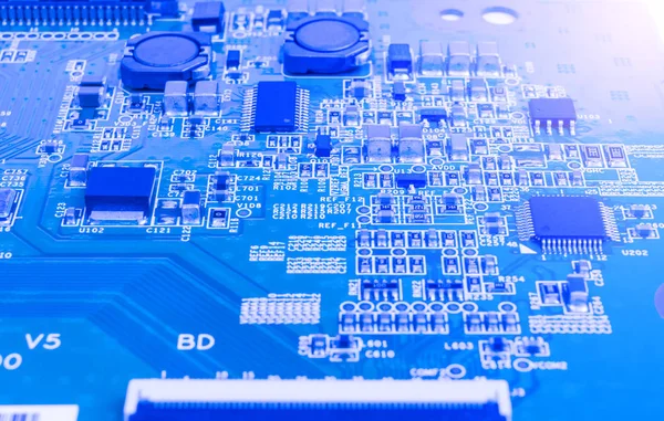 Circuit board with resistors, microchips and electronic components. Electronic computer hardware technology. Integrated communication processor. Information engineering component. Semiconductor. PCB. — Stock Photo, Image