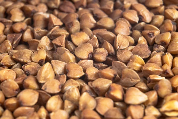 Boekweit. Achtergrondstructuur van boekweit. Macro shot van boekweit textuur. Buckwheat achtergrond, vers en droog. — Stockfoto