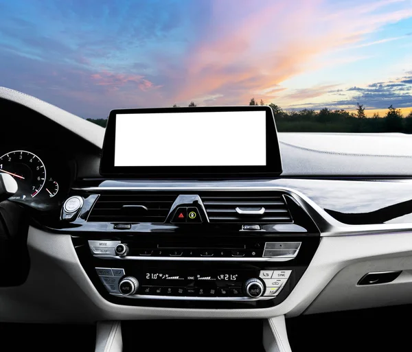 Monitor in car with isolated blank screen use for navigation mapMonitor in car with isolated blank screen use for navigation maps and GPS. Isolated on white with clipping path. Car detailing. Car display with blank screen. Modern car interior details