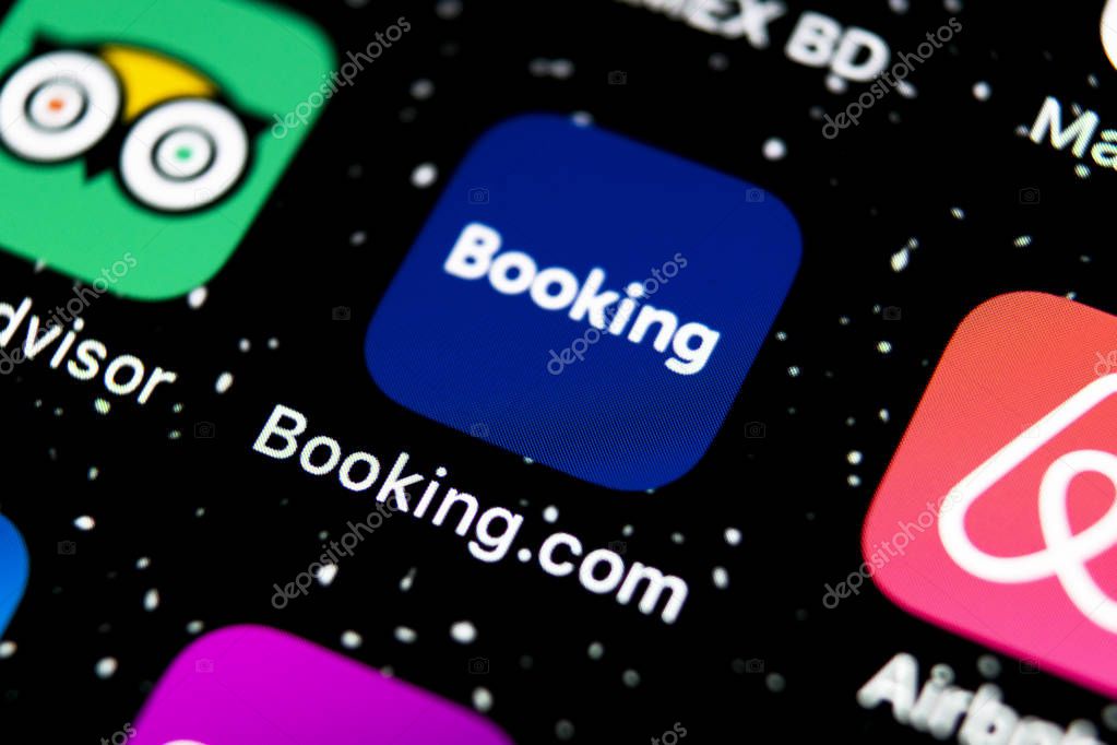 Sankt-Petersburg, Russia, February 3, 2019: Booking.com application icon on Apple iPhone X screen close-up. Booking app icon. Booking.com.  Social media app. Social network