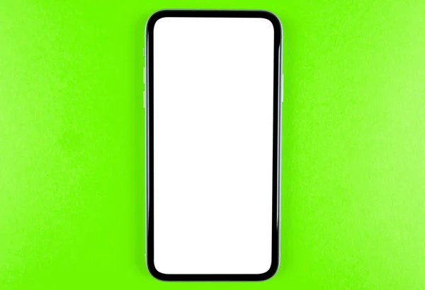 Smartphone with blank screen mock up. Smartphone isolated screen. Mobile phone white screen with copy space and clipping path. Empty space for text. Isolated white screen. — 스톡 사진