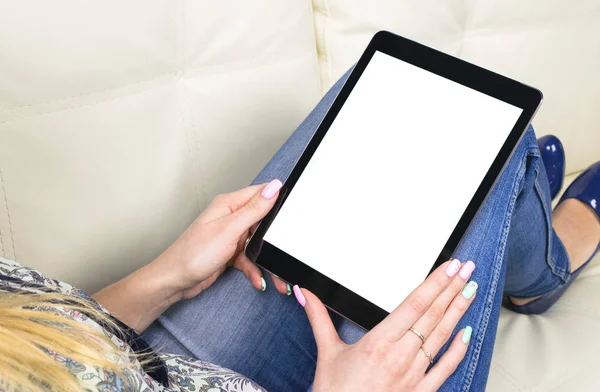 Tablet mockup in woman hand with clipping path. Modern tablet computer mock up with blank white screen. Empty space for text. Copy space. Isolated white screen.