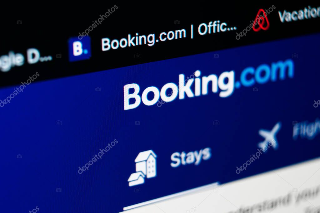 Sankt-Petersburg, Russia, May 11, 2020: Booking.com application homepage icon on Apple iMac screen close-up. Booking app icon. Booking.com. Social media app. Social network