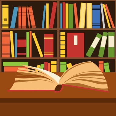 Açık kitap bir masa üzerine yalan 