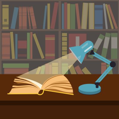 Bir iş lamba ışığında açık kitap