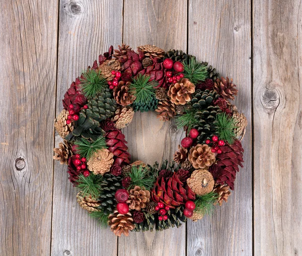 Holiday wreath on rustic wooden boards — Φωτογραφία Αρχείου