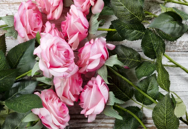 Filled frame of artificial pink roses for love concept — Stock Photo, Image