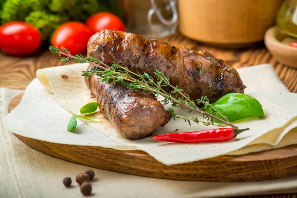Grilled sausage with sauce — Stock Photo, Image