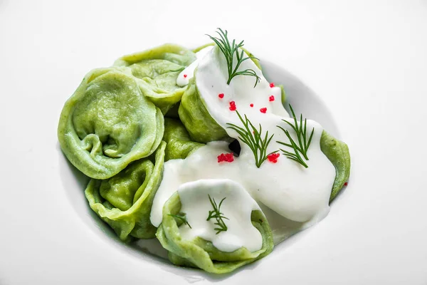 Ravioli pasta from green dough with mushroom stuffing — Stock Photo, Image