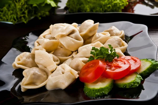 Eating fast food, on a plate — Stock Photo, Image