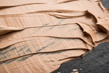 Vakfı, yüz kremi siyah bir arka plan üzerinde