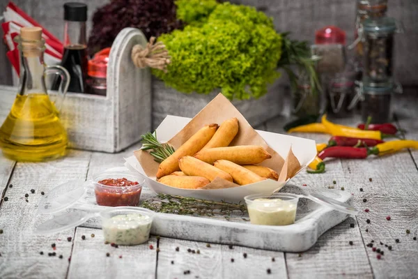 Corn dog. Sausage baked in corn dough served with ketchup — Stock Photo, Image