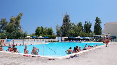 AFANDOU VILLAGE, RHODES, GREECE - JULY 26, 2019: Water aerobics class at Dessole Lippia Golf Resort Hotel