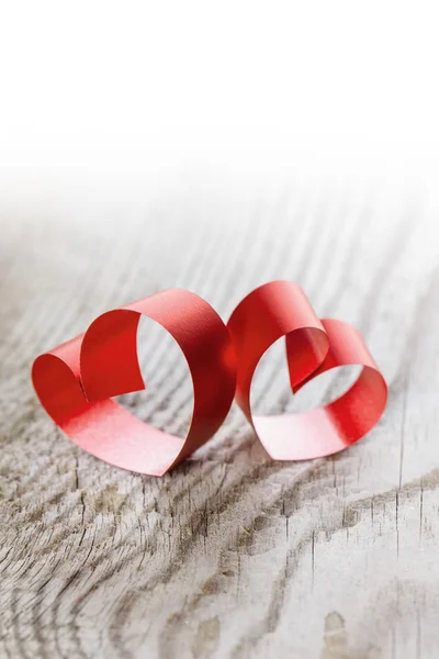 Ribbon hearts on wooden background — Stock Photo, Image